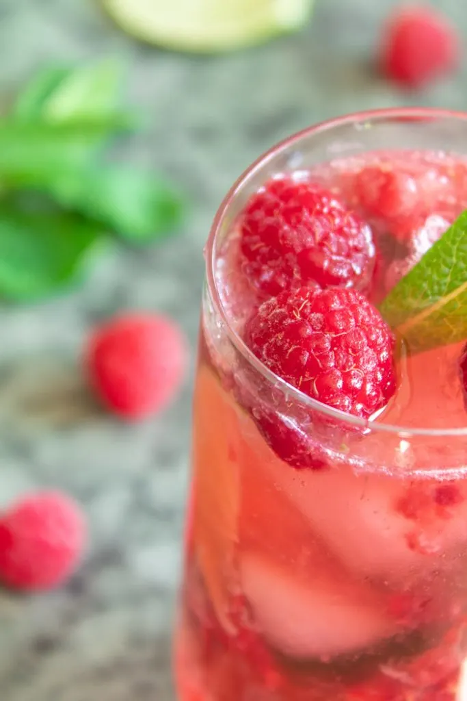 Glass of raspberry mojito